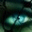 A pixelated image shows a dark, blurry face with glowing eyes on the left and green text reading 'Original Icons .com' on the right against a solid background.