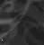 Animated sequence of pixelated text and symbols on a dark, patterned background with shifting white graphic elements.