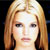 Static pixelated portrait of a person with long light brown hair against dark background, rendered in low-resolution 256x256 pixels.