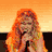 Four distinct pixelated images of a woman with long hair in various poses and backgrounds, including orange gradient, dark blue stage lighting, and close-up expressions.