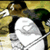 Pixelated static image of a character with dark hair, white face, and black clothing against a yellowish background.