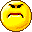 Two pixelated yellow circular faces with brown outlines, each displaying distinct angry expressions against a gray background.
