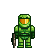 Pixel art of a green armored figure with an orange-yellow visor holding a brown object, standing against a gray background.