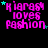Pixelated text 'kiara loves fashion' in bright pink with cyan stars on black background, animated star positions shift across frames.