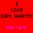 Red background with black text reading "I LOVE SAM HART!!!!" repeated twice, each followed by five pink heart symbols.