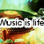 Pixelated landscape with green trees, blue sky, and brown terrain overlaid by white text reading 'Music is life' in black lettering.