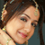 Static 50x50 pixel icon showing a close-up of a person's face with brown hair, visible ear, and partial shoulder in low-resolution pixel art style.