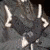 Pixelated grayscale image of a person in motion with large black text 'FOR' and 'family' overlaid on white and gray backgrounds.
