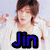 A pixelated image of a person in white clothing with brown hair, overlaid with text and symbols.