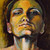 Pixelated portrait of a person with closed eyes, warm-toned skin, and dark hair against a gradient background.