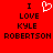 Red background with black pixelated text reading "I LOVE KYLE ROBERTSON" and a white heart symbol replacing the word "LOVE" in one instance.
