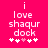 A bright pink background displays white pixelated text reading "i love shaqur dock" with five small heart symbols below, where the third symbol is light pink and the rest are white.