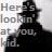 A pixelated static image shows a dark silhouette of a figure wearing a top hat and long coat, with partial text reading "Her is looking at you." in light gray letters.