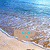 Pixelated beach scene with blue water, brown sand, and a light brown rectangular overlay containing cyan text.