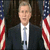 A pixelated animated contact sheet showing two frames of a political campaign icon with text and an American flag backdrop.