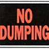 Black rectangular sign with bold orange text reading "NO DUMPING" in two lines, bordered by thin white lines at top and bottom.