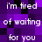 Pixelated text repeats across a purple and black background with white lettering