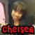 Pixelated image of a person with light brown hair and closed eyes, wearing dark clothing against a muted background with red text reading 'chelsea' at the bottom.