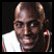A two-frame contact sheet showing a basketball player's face and his jersey with name and number.