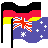 Pixelated flag icon showing two national flags side-by-side on black poles against a gray background.