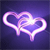 Pixelated neon-style heart shape with glowing white outline on dark purple background, rendered in low-resolution digital art style.