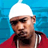 Static 48x48 pixel icon showing a person wearing a white beanie, dark sunglasses, and red jacket against blue background with visible dithering and pixelation.