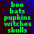 Green pixelated text listing 'boo bats pupkins witches skulls' on a dark blue spiderweb-patterned background with one frame showing a gray area.