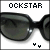nine identical pixelated images showing dark sunglasses with a white background, each containing distorted text above the glasses