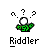 Pixelated static icon of a green-clad figure with white spherical head and question marks above, labeled "Riddler" in blocky text below on gray background.