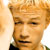 Static 50x50 pixel icon showing a close-up of a person's face with light brown hair and neutral expression, rendered in low-resolution pixel art style on white background.