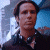 A pixelated image of a person in dark clothing against a light background, with green text reading 'Original Icons .com' on the right side.