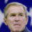 Pixelated of identical male faces with mustaches, some with red devil horns, orange flames, and a black with orange text reading "Bush is the devil"
