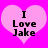 Two side-by-side pink heart-shaped icons with black text "I Love Jake" on a bright magenta background, displayed as an animated contact sheet frame pair.