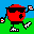 Red circular character with black sunglasses, black limbs, and white shoes performs walking animation across green grass under blue sky.