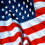 Animated sequence showing a person holding an American flag against a backdrop of the U.S. flag, with figures in firefighter gear and others nearby.