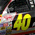 Animated sequence showing a race car with number 40, transitioning from full view to motion blur and partial fragments.