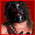A four- shows a person with dark hair in various poses against red and blue backgrounds, including text reading KANE