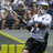 Pixelated image of a person in a white jersey with number 12, black shorts, and a crowd in the background, with blue text reading "Forever a" and "Blue Jay!!" on black