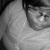 Black-and-white image of a person with dark hair and glasses, wearing a light-colored shirt, showing subtle facial expression changes across frames.