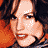 A 4-frame contact sheet of a pixelated celebrity face with varying expressions and an overlaid website URL, arranged in a 2x2 grid on a gray background.