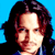 A 2x2 contact sheet of a pixelated animated icon featuring Johnny Depp's face on blue backgrounds and the text 'CoolBuddy.com' in metallic letters on teal background, with three visible frames showing slight facial expression differences.