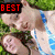 A person in a blue and white swimsuit lies on grass with text overlays changing across frames.