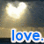 A static image shows a glowing heart shape with the word 'love.' in blue text overlaid on a dark background.