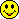 16 pixelated yellow smiley faces with black outlines, each displaying distinct facial expressions against a gray background