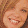 A four- shows a person with light brown hair smiling in the top two , and text below reading "NO. 1 Fan!" and "All about S Club 8"