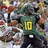 Pixelated image of a character in green and black attire with a yellow number 10 on chest, surrounded by blurred background elements.