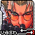 Pixelated image of a person with orange hair and dark clothing, framed by a filmstrip border with 'Vash' text at the bottom.