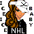 Pixelated cartoon-style icon of a person with long brown hair wearing a black shirt with white text, surrounded by scattered letters and a speech bubble containing symbols.