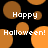 Black background with orange circular shapes and white text reading "Happy Halloween!" in a pixelated font.