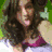 five pixelated images showing people in various poses with a central black displaying green text